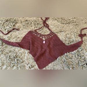 cider, small brown crochet halter top with tie around in back, seashell on front